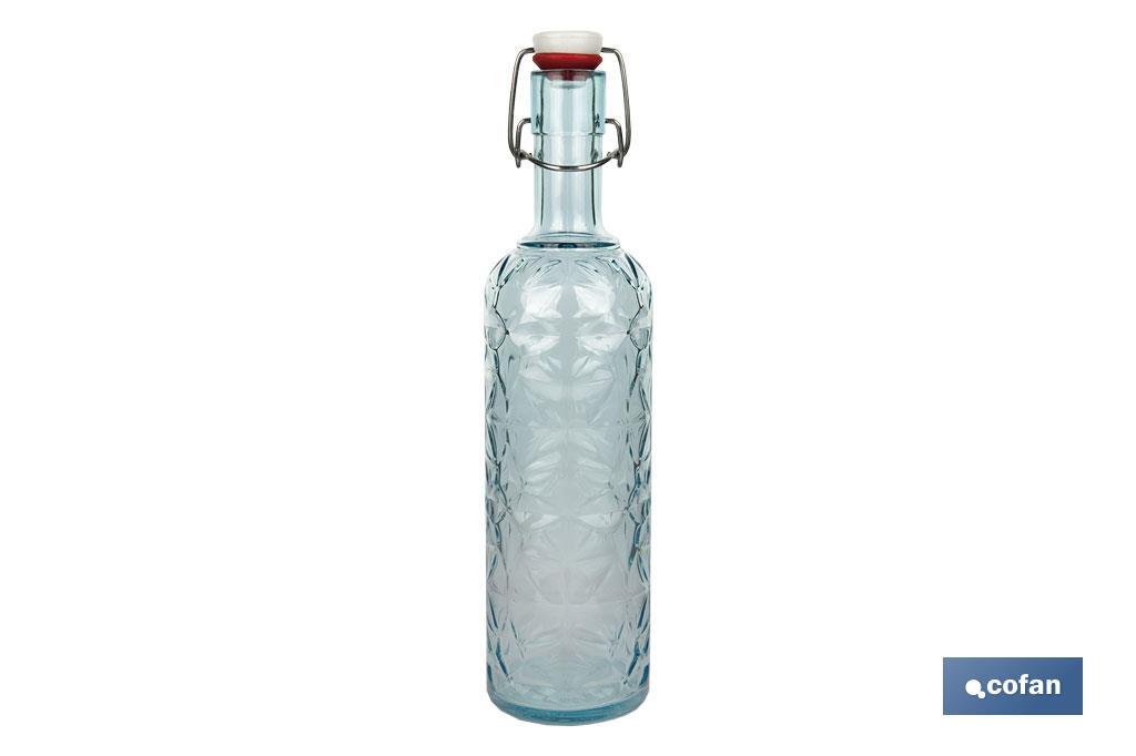Botella de vidrio azul transparente con cierre de estribo